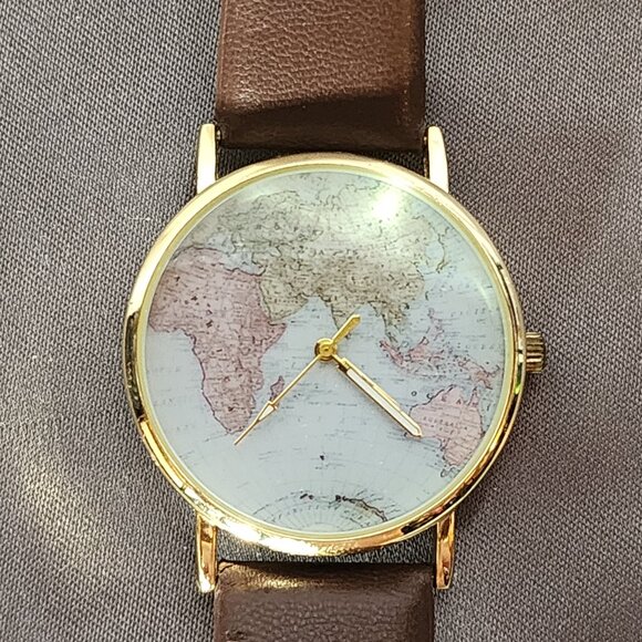Accutime Watch Corp. Blue World Map Face Gold Tone Analog Stainless Back Watch - Picture 1 of 16